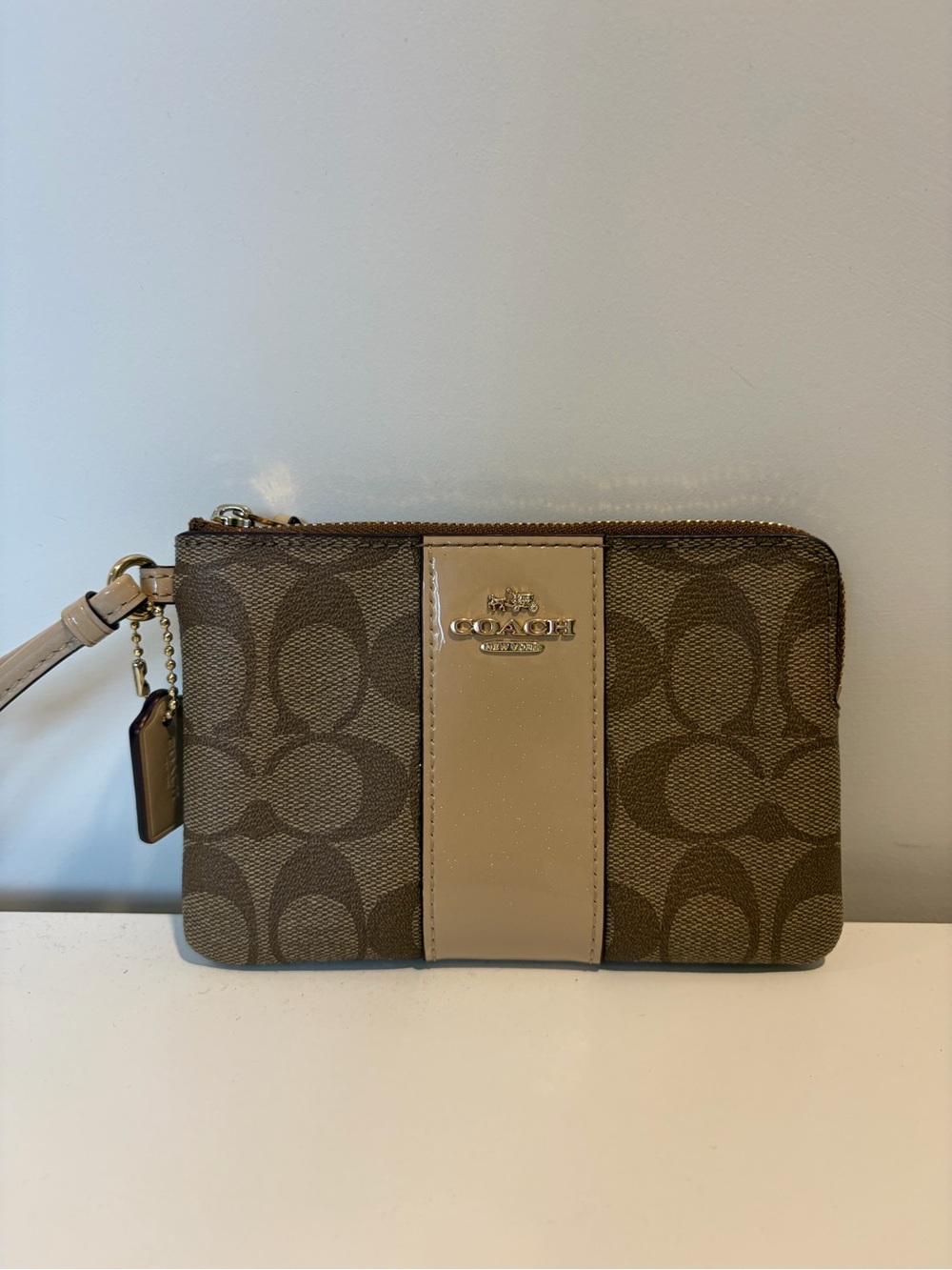 Coach Signature Canvas Wristlet in Brown and Tan